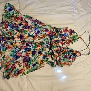 Beautiful low back, wrap around floral romper
